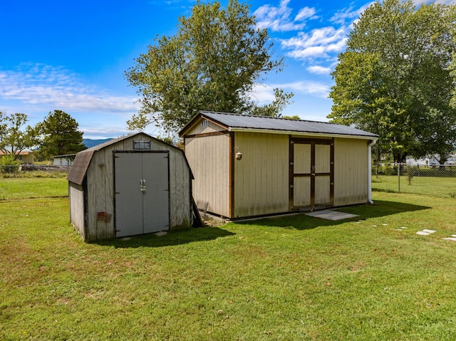 view of outdoor structure featuring a yard