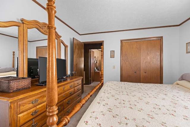 carpeted bedroom with a textured ceiling, a closet, and crown molding