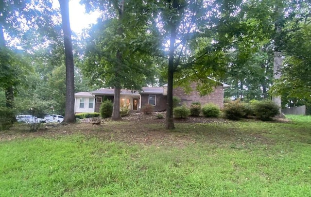 exterior space with a front lawn