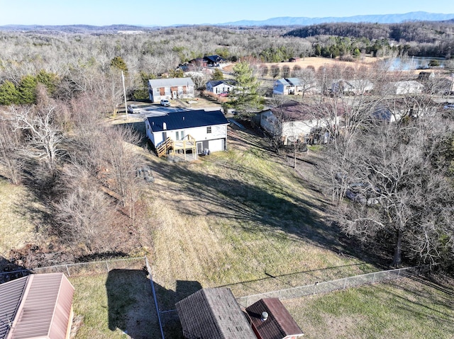 drone / aerial view featuring a mountain view