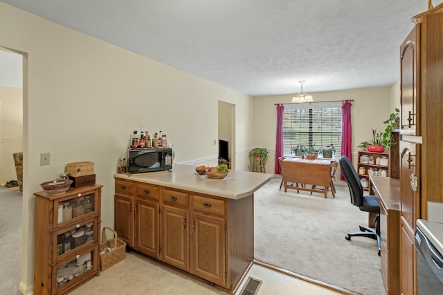 961 Woodway Dr, Morristown, TN 37814 - kitchen featuring black microwave, a peninsula, light countertops, visible vents, and light colored carpet