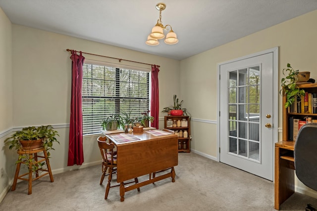 961 Woodway Dr, Morristown, TN 37814 - dining space featuring baseboards, a chandelier, and light carpet