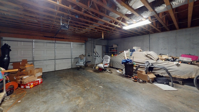 garage featuring a garage door opener