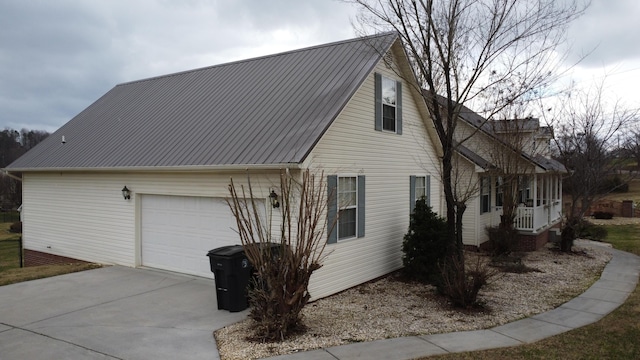 view of property exterior featuring a garage