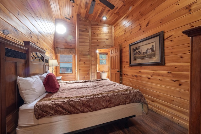 bedroom featuring hardwood / wood-style floors, lofted ceiling, wood walls, and wooden ceiling