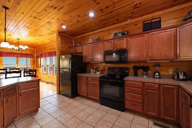 kitchen with pendant lighting, black appliances, a notable chandelier, light tile patterned flooring, and wood ceiling