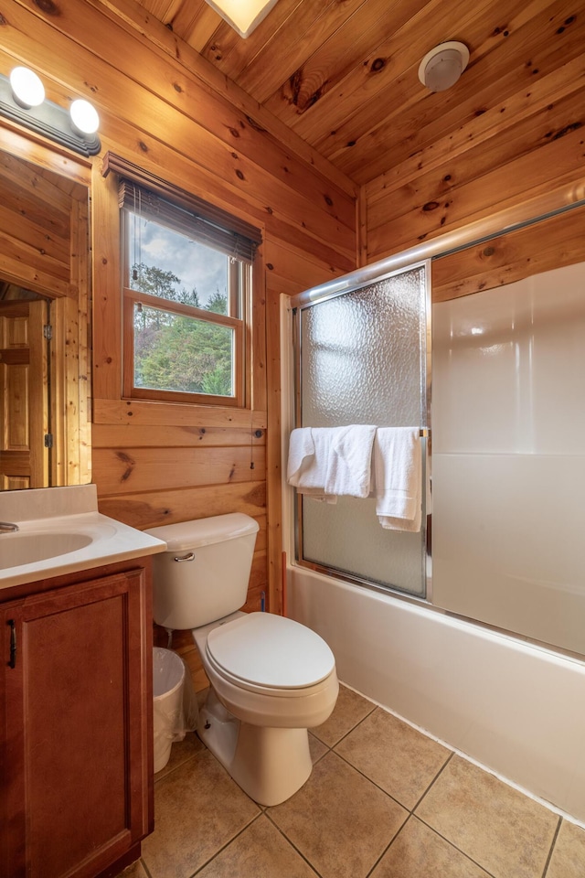 full bathroom featuring vanity, wood walls, shower / bath combination with glass door, wooden ceiling, and toilet