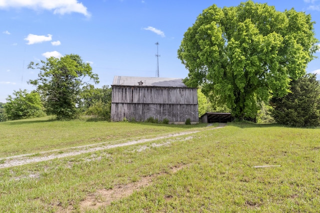 10741 Rutledge Pike, Blaine, TN 37709 - view of grassy yard featuring an outdoor structure