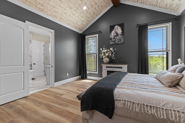 1670 Bays Mountain Rd, New Market, TN 37820 - bedroom with baseboards, ensuite bath, crown molding, vaulted ceiling, and wood finished floors