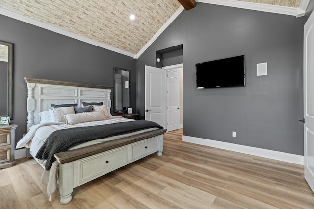 1670 Bays Mountain Rd, New Market, TN 37820 - bedroom with baseboards, crown molding, light wood-type flooring, and high vaulted ceiling