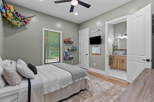 1670 Bays Mountain Rd, New Market, TN 37820 - bedroom with light wood finished floors, ensuite bathroom, baseboards, ceiling fan, and recessed lighting