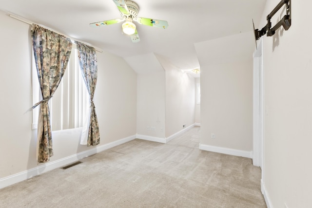 bonus room featuring carpet, visible vents, ceiling fan, and baseboards