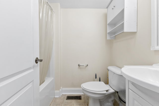 bathroom with tile patterned flooring, toilet, vanity, visible vents, and baseboards