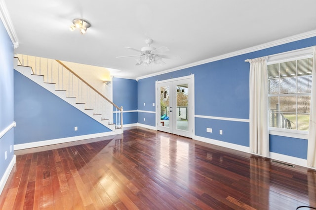 interior space featuring baseboards, stairway, wood finished floors, crown molding, and french doors