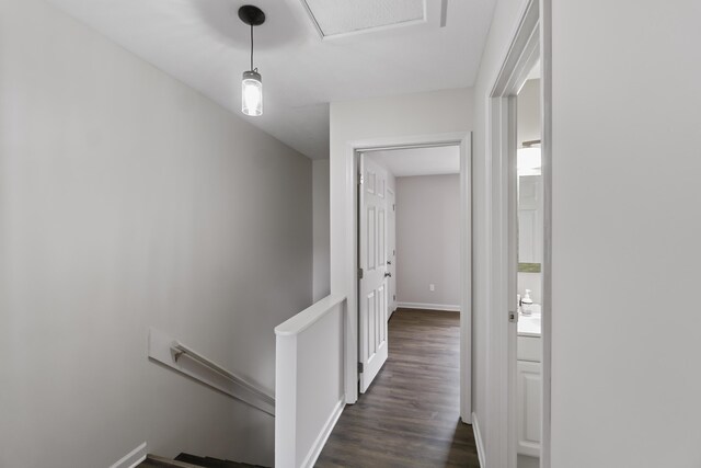 corridor featuring dark hardwood / wood-style floors