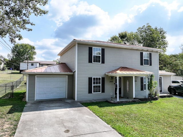 view of front facade with covered porch, a garage, and a front yard