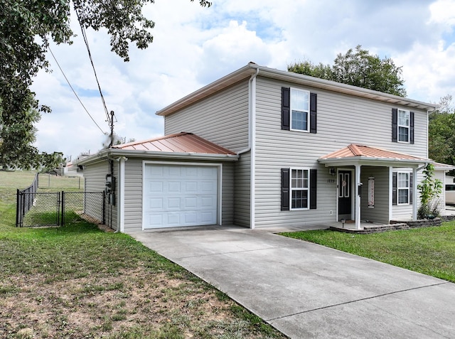 view of front facade with a garage and a front lawn