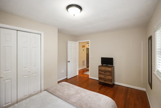 2368 Hall Rd, Dandridge, TN 37725 - unfurnished bedroom with dark wood finished floors and a closet