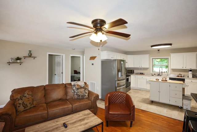 2368 Hall Rd, Dandridge, TN 37725 - living area featuring ceiling fan and light wood finished floors