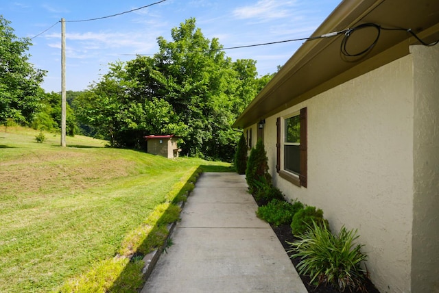 2368 Hall Rd, Dandridge, TN 37725 - view of green lawn featuring a storage shed