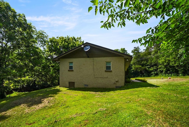 2368 Hall Rd, Dandridge, TN 37725 - view of property exterior with a lawn and stucco siding