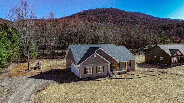 view of front of home featuring a mountain view