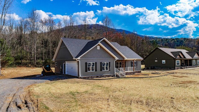 view of front facade featuring a mountain view