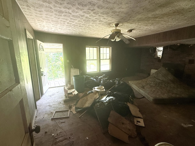 1340 Ryan Rd, Fall Branch, TN 37656 - bedroom with access to exterior, a ceiling fan, and a textured ceiling