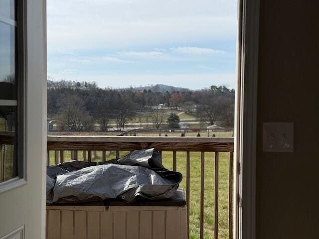 view of wooden balcony with a deck