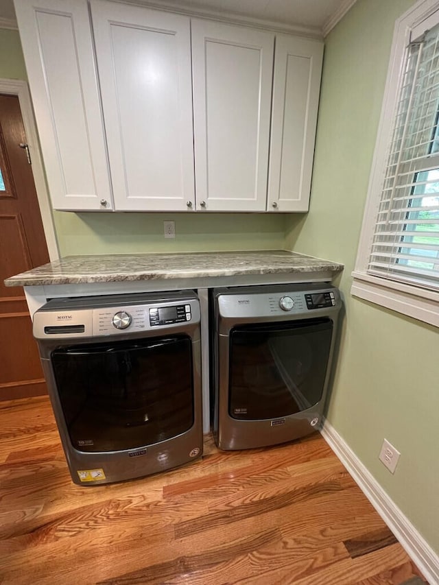 3207 Dove Ln, White Pine, TN 37890 - laundry room with separate washer and dryer, light wood-style floors, cabinet space, crown molding, and baseboards