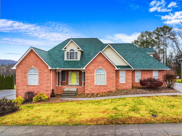 view of front property with a front lawn