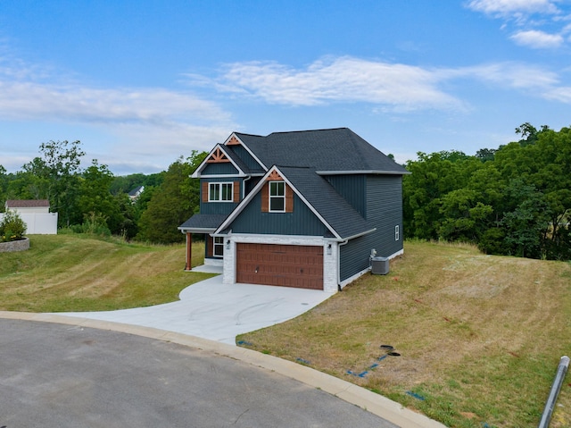2490 Stream View Ln, Morristown, TN 37814 - craftsman house with driveway, a front yard, an attached garage, and a shingled roof