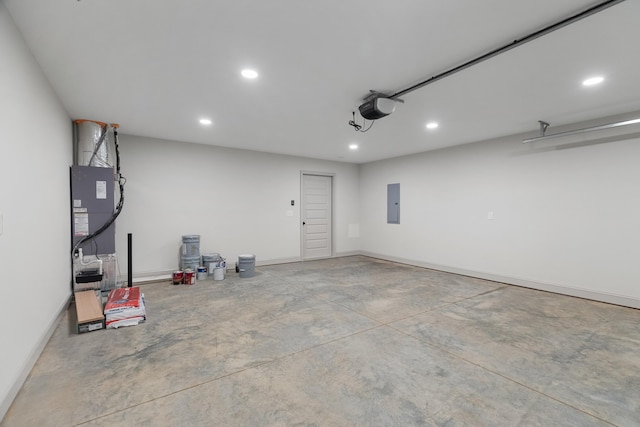 2490 Stream View Ln, Morristown, TN 37814 - garage with a garage door opener, recessed lighting, electric panel, and heating unit