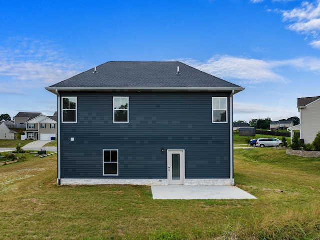 2490 Stream View Ln, Morristown, TN 37814 - back of property with a lawn, a patio, and roof with shingles