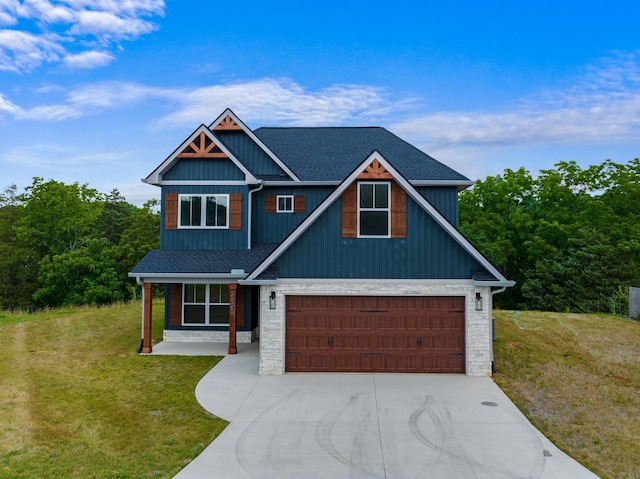 2490 Stream View Ln, Morristown, TN 37814 - view of front of house featuring driveway, a front lawn, a garage, roof with shingles, and board and batten siding