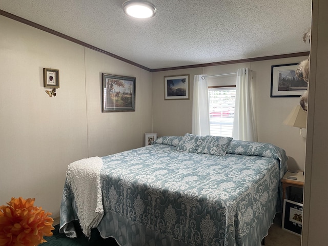 bedroom with a textured ceiling and ornamental molding