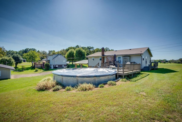 view of yard with a wooden deck