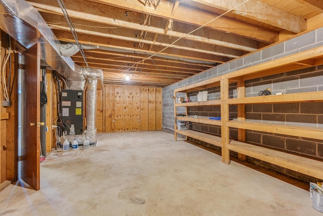 basement featuring heating unit