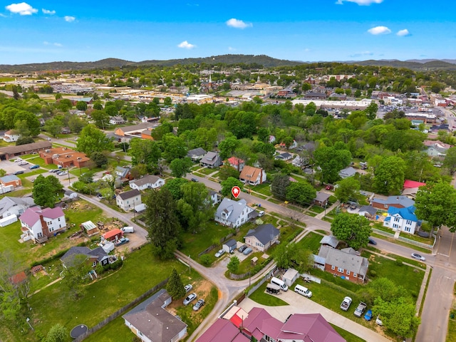 drone / aerial view featuring a mountain view and a residential view