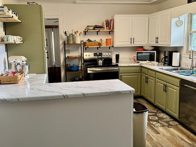 302 Buckingham Dr, Newport, TN 37821 - kitchen featuring appliances with stainless steel finishes, light wood-type flooring, open shelves, white cabinets, and green cabinets