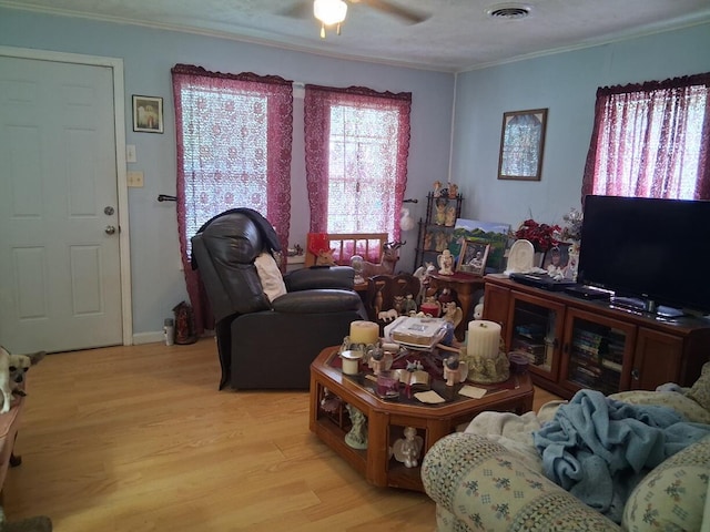 450 Old Sevierville Hwy, Newport, TN 37821 - living room with crown molding, light wood-style floors, and ceiling fan