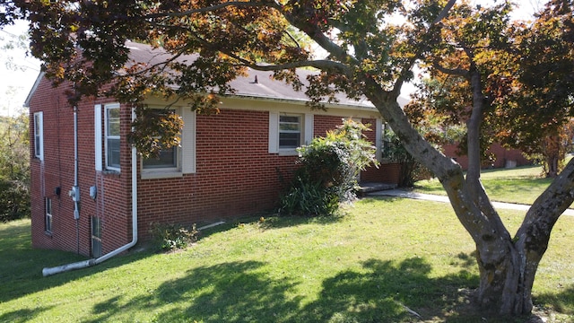 view of property exterior featuring a yard