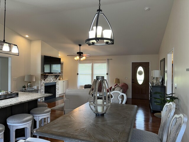 122 Florence Cir, Dandridge, TN 37725 - dining area featuring dark wood-style floors, a fireplace, and a ceiling fan