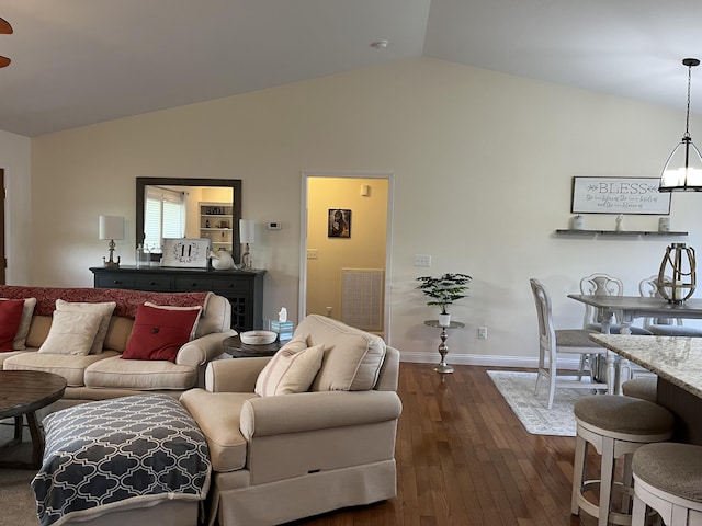 122 Florence Cir, Dandridge, TN 37725 - living room with dark wood finished floors, baseboards, and high vaulted ceiling