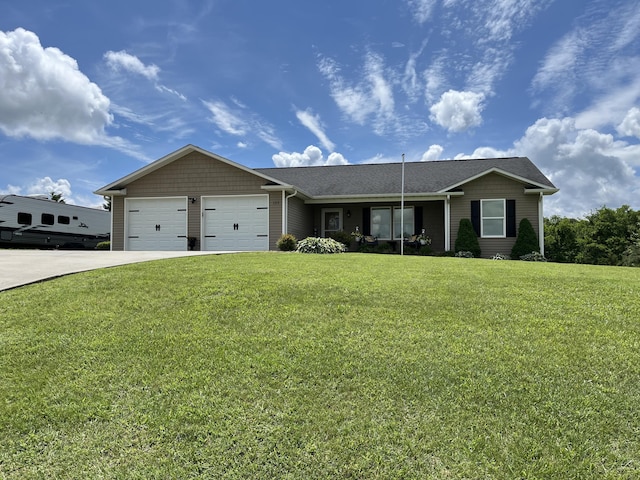122 Florence Cir, Dandridge, TN 37725 - view of front of house with a garage, a front lawn, driveway, and roof with shingles