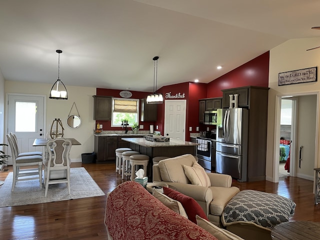 122 Florence Cir, Dandridge, TN 37725 - living area with vaulted ceiling, dark wood-type flooring, and baseboards