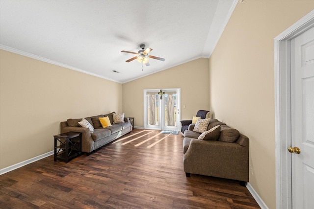 living room featuring lofted ceiling, ornamental molding, dark wood-style floors, and baseboards