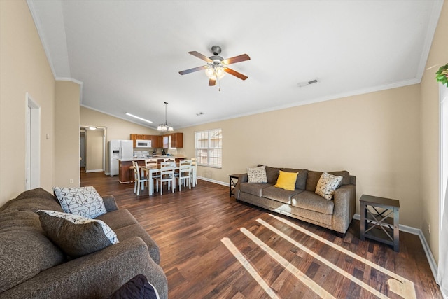 living room featuring ceiling fan, visible vents, baseboards, vaulted ceiling, and dark wood-style floors