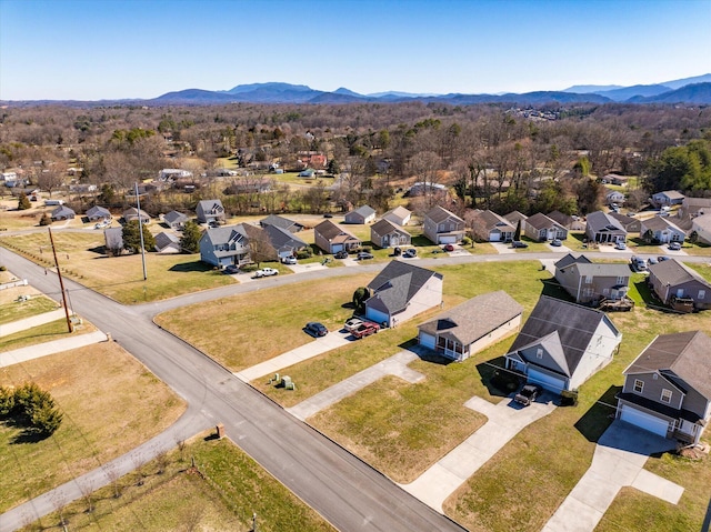 drone / aerial view with a residential view and a mountain view