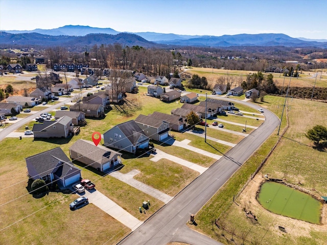 bird's eye view with a residential view and a mountain view